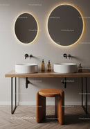 Modern Bathroom with Double Sinks and Warm Backlit Round Mirrors