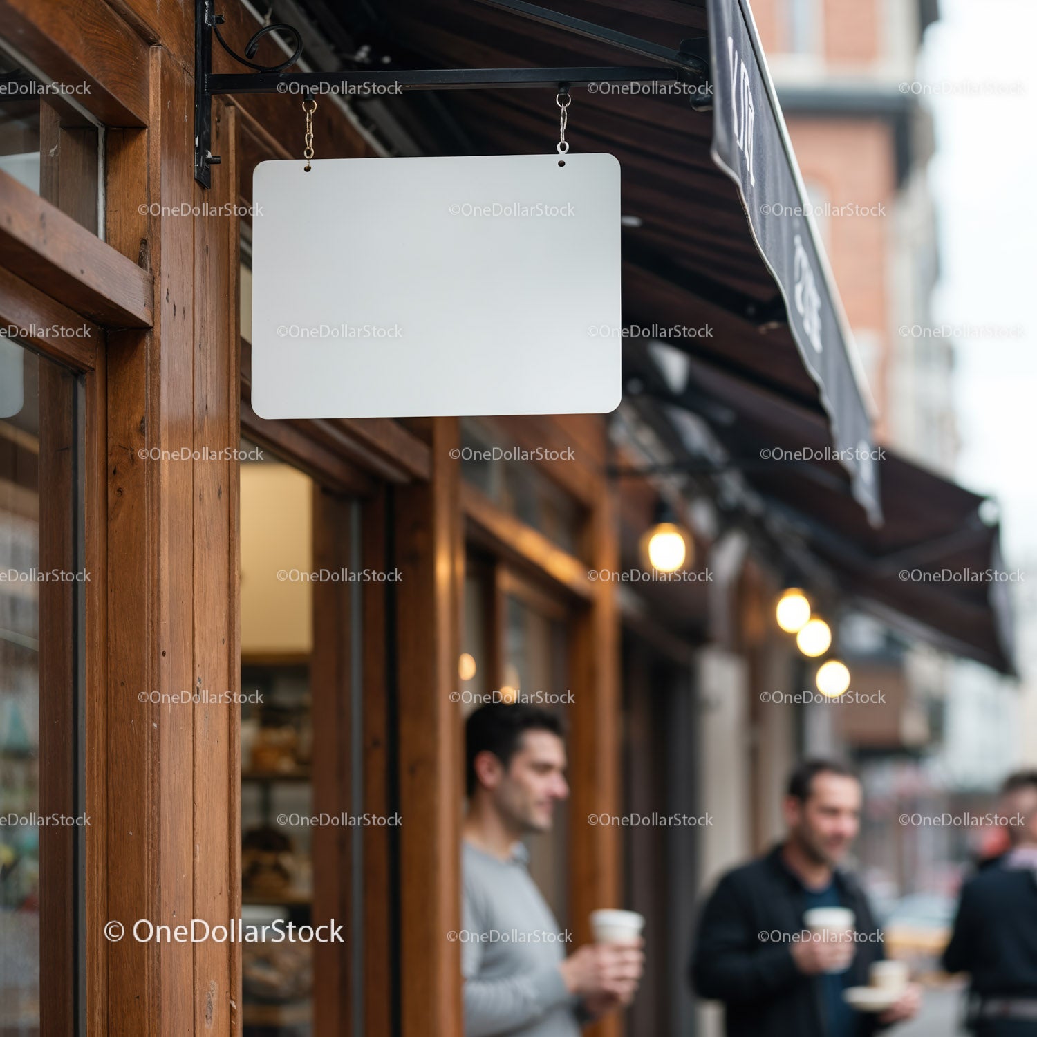 People enjoying coffee outside a wooden cafe