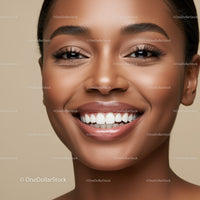 Closeup of happy woman with glowing skin and bright smile
