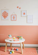 Decorative Children's Room with Pastel Wall Art, Playful Toys, and Cozy Interior