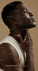 Close-Up Portrait of a Young Man Showcasing Skin and Confident Expression