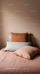Cozy Bedroom with Cushions and Linen in Soft Neutral Tones