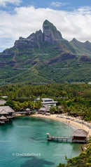 Scenic Mountain and Beach Resort with Palm Trees and Turquoise Water
