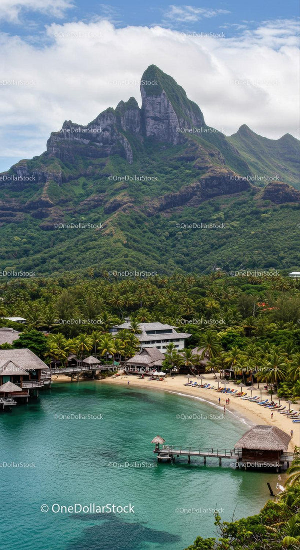 Scenic Mountain and Beach Resort with Palm Trees and Turquoise Water