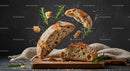 Rustic sourdough bread with fresh rosemary on board