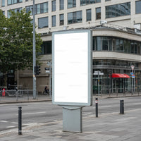 Empty Urban Billboard on City Sidewalk Displaying Blank Space
