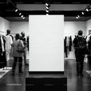 Minimalist fashion gallery interior with modern lighting