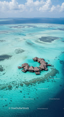 Overwater Bungalows in Turquoise Waters of Tropical Island Paradise