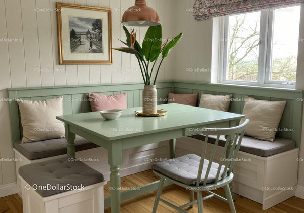 Bright and Airy Kitchen Nook with Built-In Window Bench and Large Houseplant