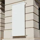 Blank vertical banner on beige stone building wall
