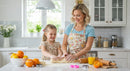 Joyful Mother and Daughter Baking Together in a Bright Kitchen