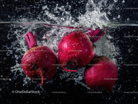 Fresh Radishes Splashing in Water in High Detail