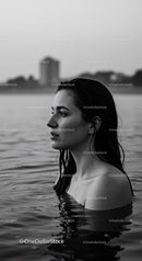 Serene Woman with Wet Hair in Water Profile Shot for Calm Mood