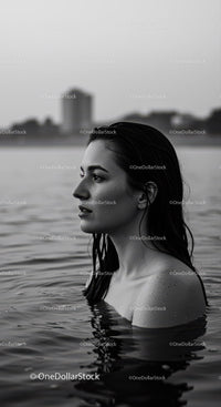 Serene Woman with Wet Hair in Water Profile Shot for Calm Mood