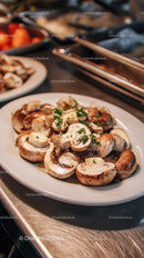 Sautéed Mushrooms with Garlic and Herbs Plate for Gourmet Cuisine
