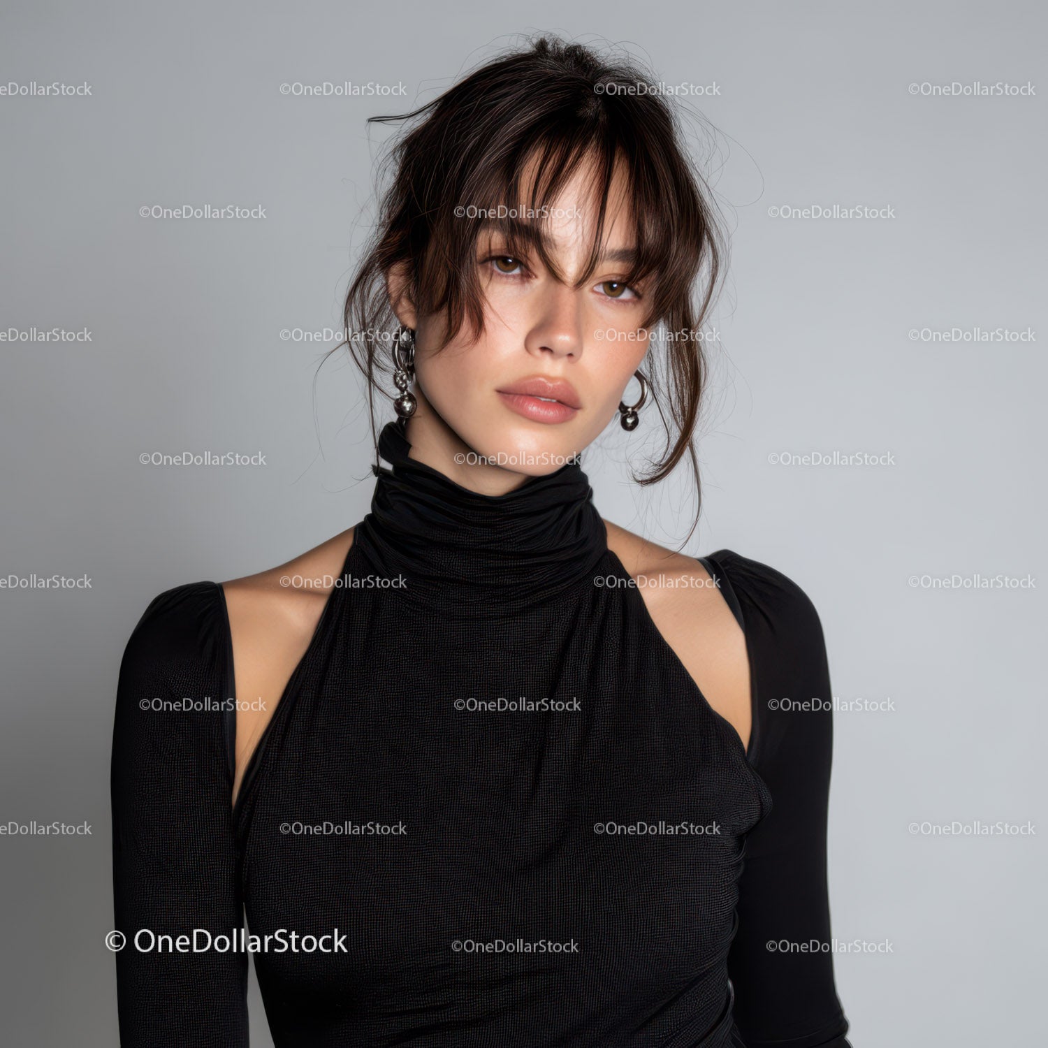 Elegant Woman with Short Hair in Black Dress and Stylish Earrings