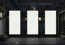 Three Vertical Blank Billboards in Urban Alleyway