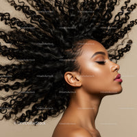 Profile of woman with voluminous curly hair and flawless skin