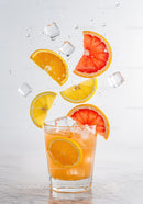 Refreshing Citrus Cocktail with Ice and Splash Effect