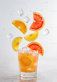 Refreshing Citrus Cocktail with Ice and Splash Effect