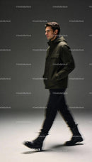 Man Walking Confidently in Casual Urban Jacket and Boots