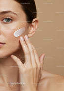 Close-up of a Woman Applying Face Cream for Skin Care Routine