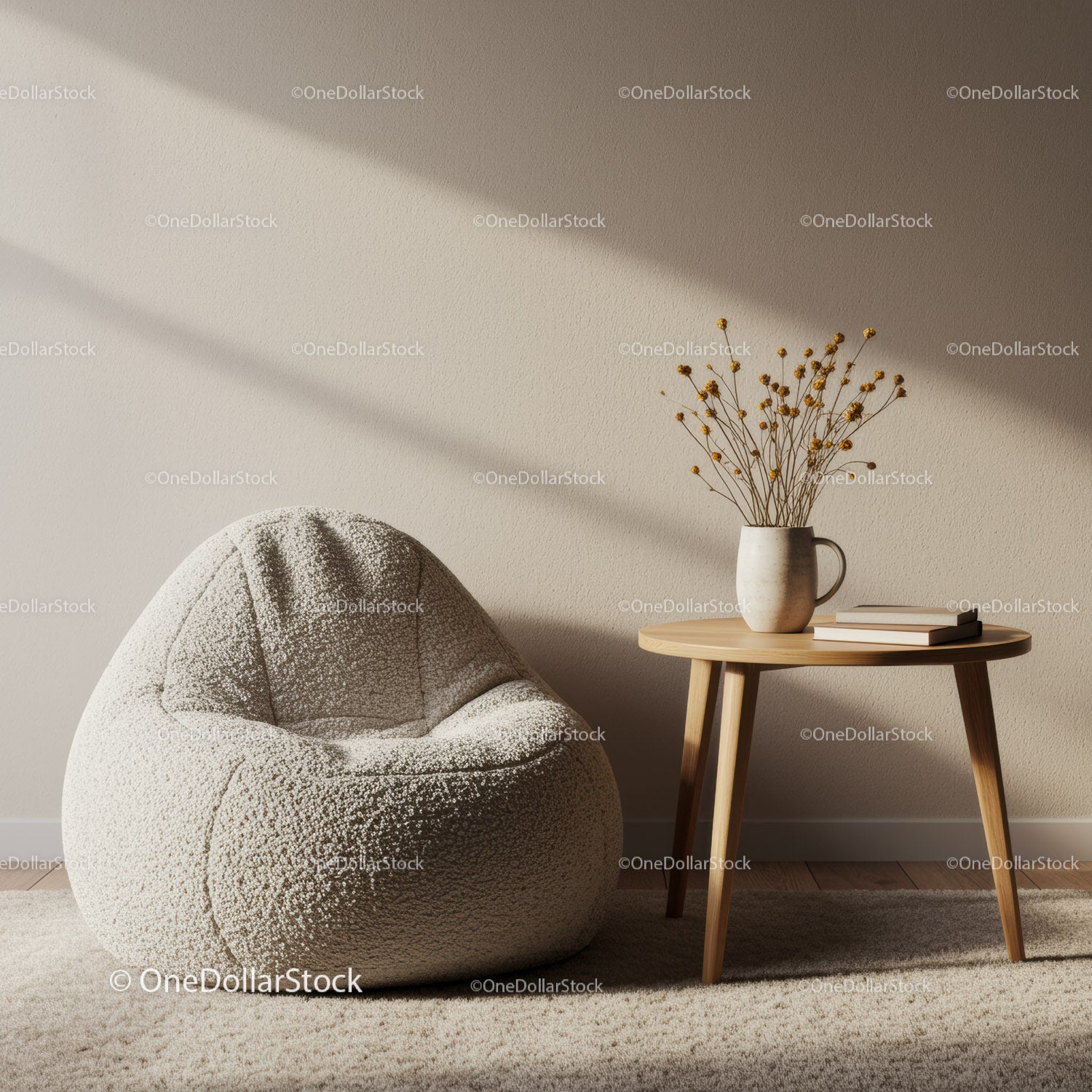 Cozy beige armchair with decorative vase on wooden table