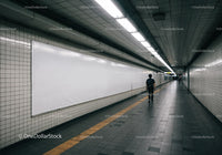 Underground Subway Tunnel with Fluorescent Lighting and Tiled Walls