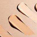Close-up of Different Beige Foundation Swatches on Paper