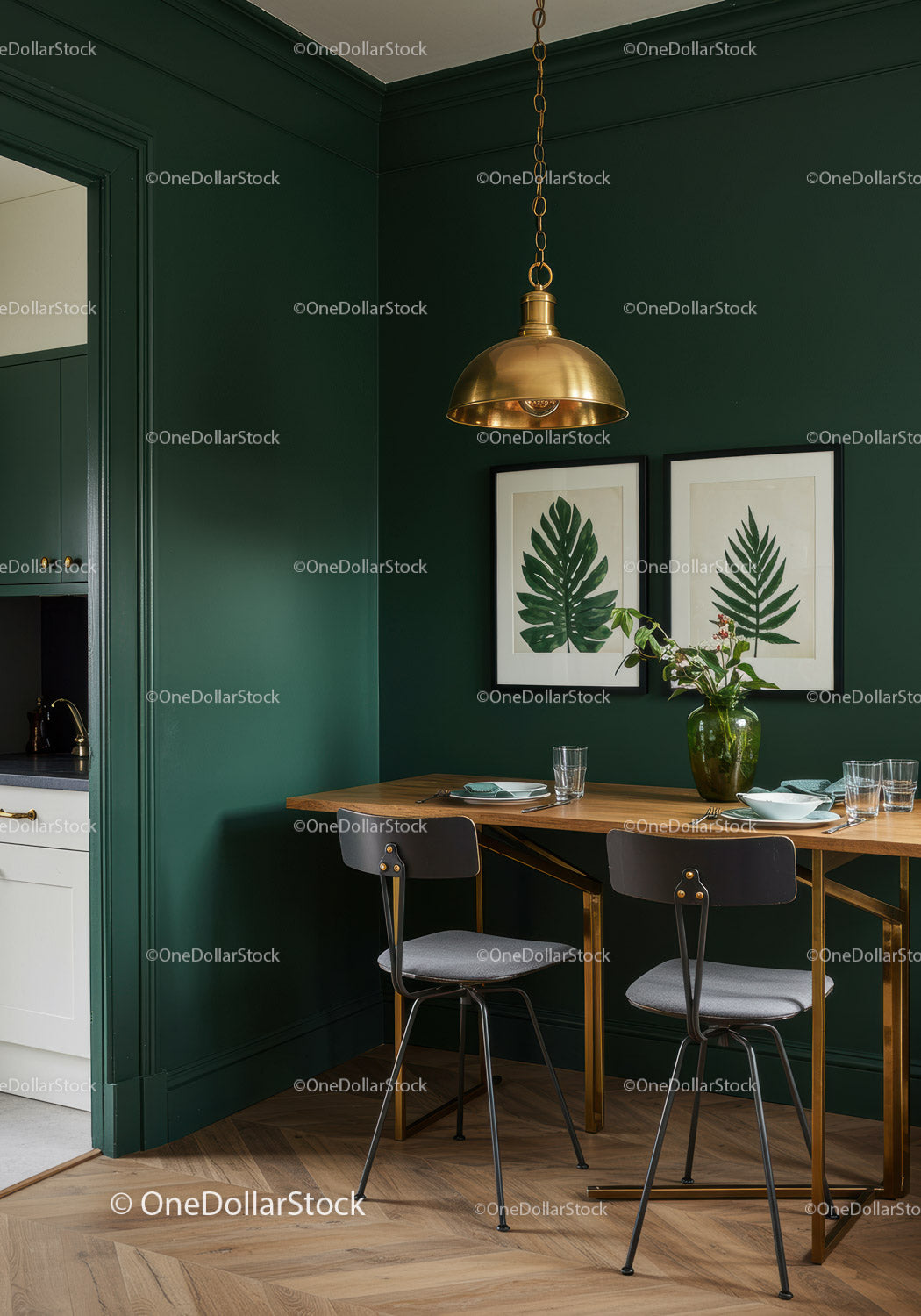 Stylish Green Accent Wall Dining Area with Botanical Artwork and Gold Pendant Light