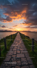 Scenic Stone Pathway Leading to Sunset Over Mountain Lake