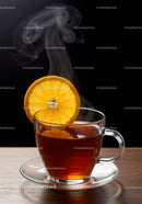 Steaming cup of black tea with fresh orange slice
