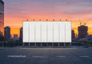 Modern City Skyline Sunset with Empty Billboard on Rooftop