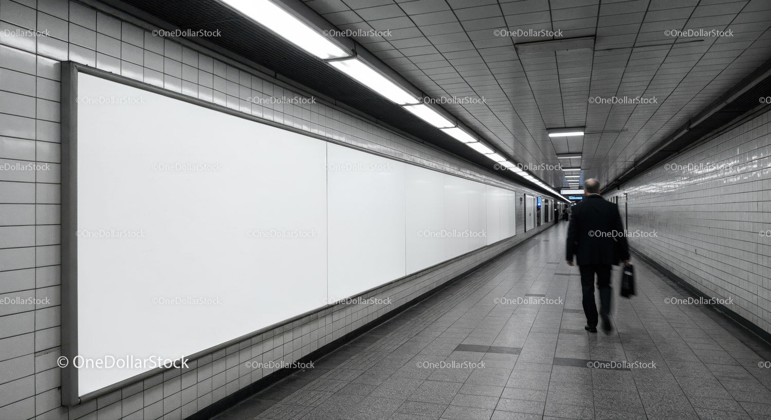 Underground Subway Passage With Tiled Walls and Fluorescent Lighting