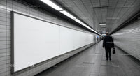Underground Subway Passage With Tiled Walls and Fluorescent Lighting