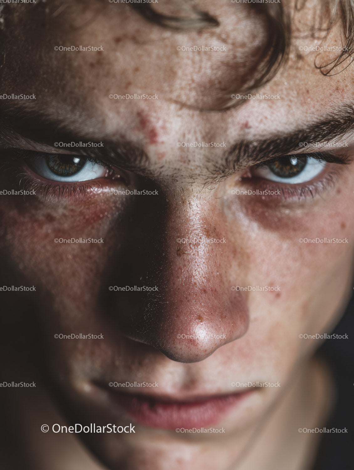 Close-up of Male Face with Intense Expression and Natural Skin Texture