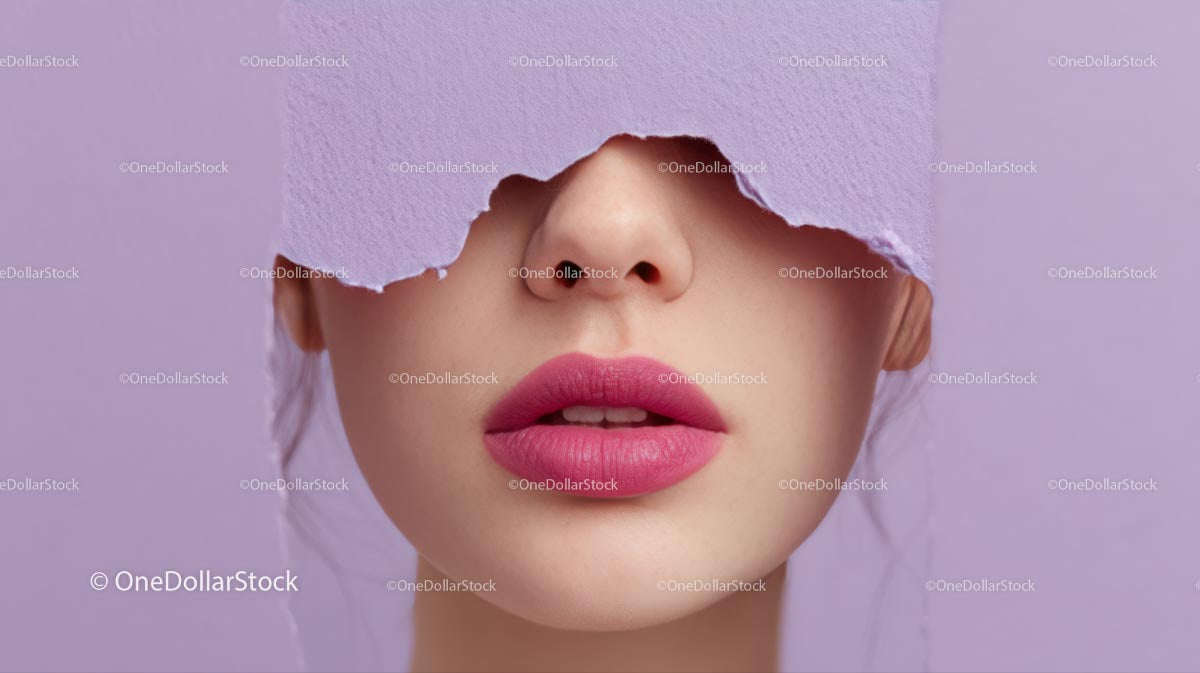 Close-Up Portrait of a Glamorous Model with Pink Lipstick