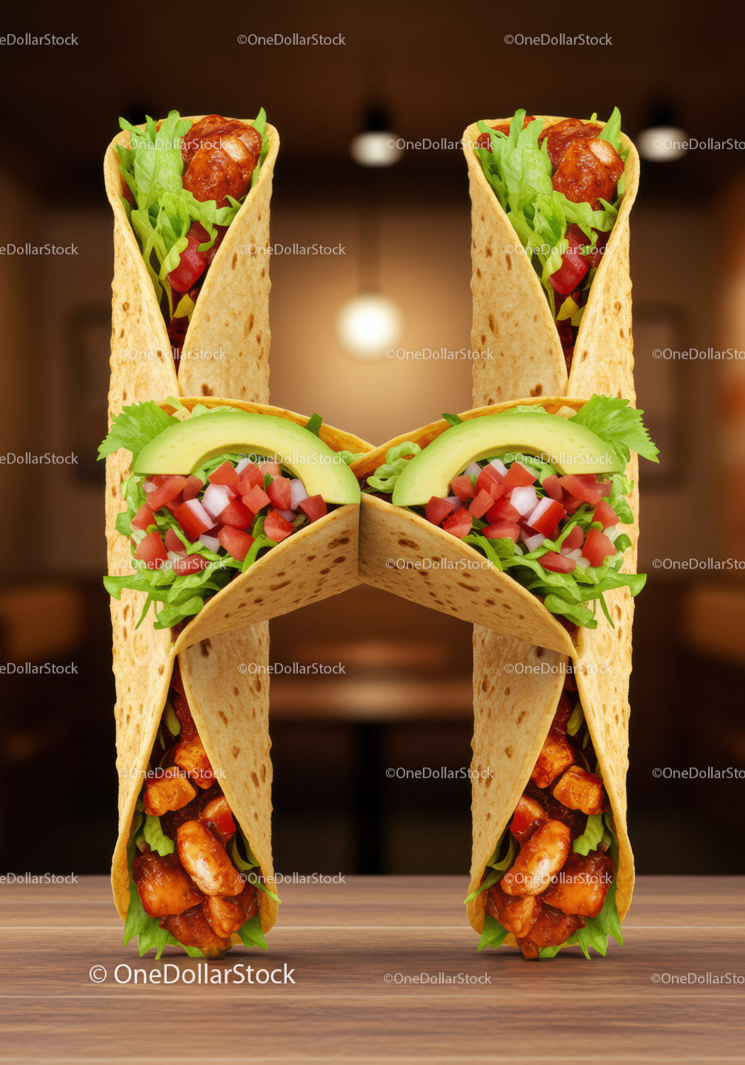 Fresh chicken and veggie wraps arranged in H shape