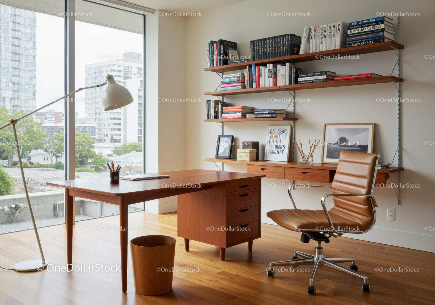 Modern home office with wooden desk and leather chair