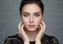 Elegant Blue-Eyed Woman Portrait with Flawless Skin and Stylish Hair