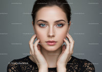 Elegant Blue-Eyed Woman Portrait with Flawless Skin and Stylish Hair