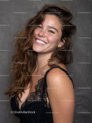 Bright Smiling Woman with Wavy Hair Wearing Black Lace Top