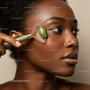 Elegant Woman Using Jade Roller for Facial Skincare and Beauty