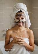 Young Woman Enjoying Facial Mask and Skincare at Home