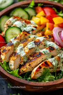 Grilled Chicken Breast with Fresh Vegetable Salad in Wooden Bowl