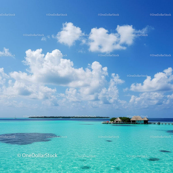 Tropical Overwater Bungalows with Turquoise Sea and Clear Blue Sky