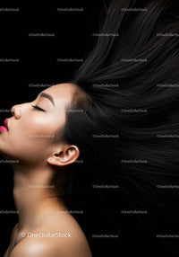 Elegant Asian woman with flowing black hair profile