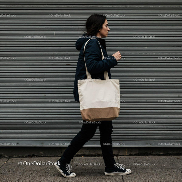 Casual woman walking with canvas tote bag in urban setting JPG Mockup Image
