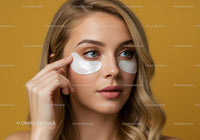 Young Woman Applying Eye Patches for Skin Care Treatment