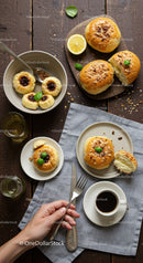 Freshly baked buns and jam cookies with coffee break